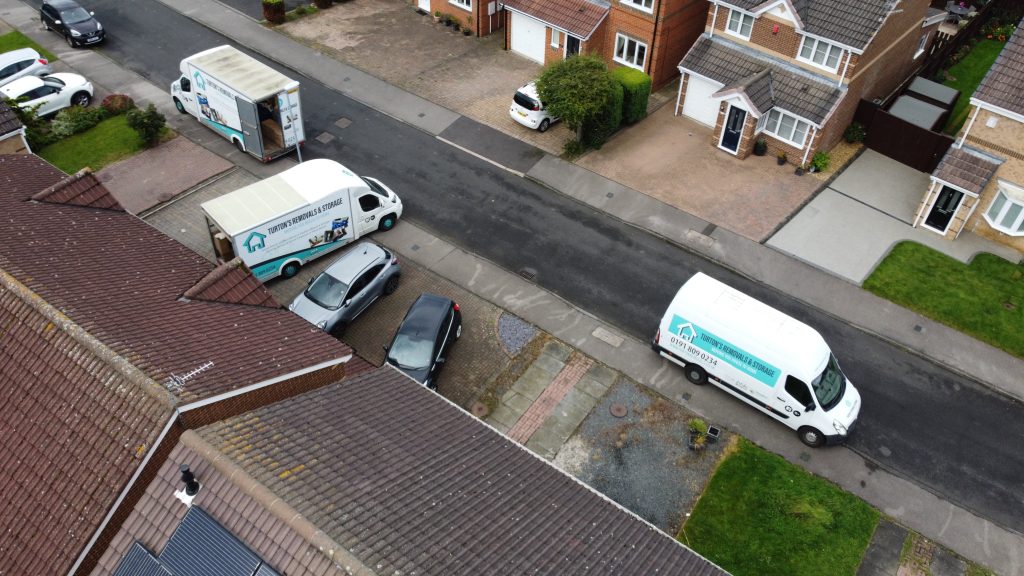 turtons removals lorries parked during a house removals in newcastle